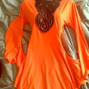 Short orange cocktail dress with embellishments